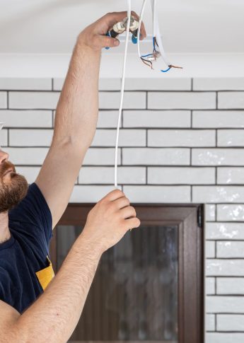 electrician-builder-at-work-installation-of-lamps-2023-11-27-05-08-03-utc
